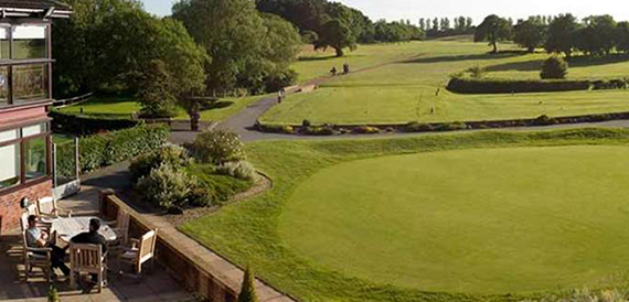 Elevated view of the golf course green from the clubhouse terrace