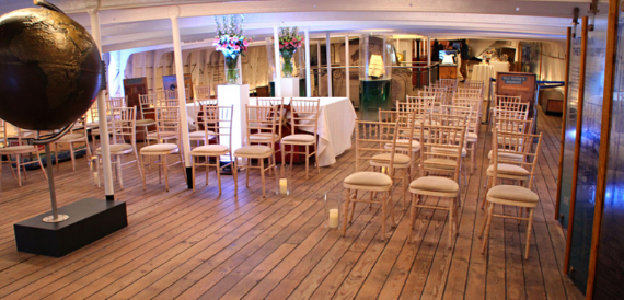 Ceremony seating on the deck beside a large globe display