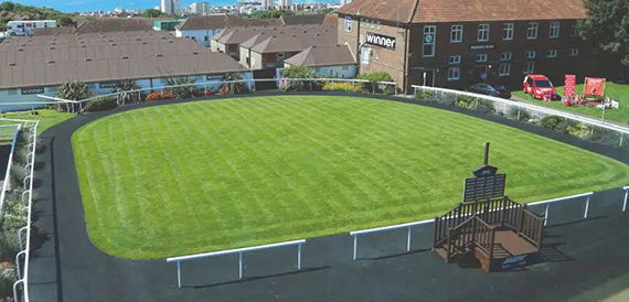 Aerial view of the racecourse parade ring and manicured lawn