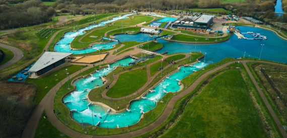 Aerial view of the turquoise white water rapids course and surrounding grounds